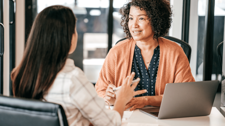 A parent discussing nanny placement options with a nanny agency