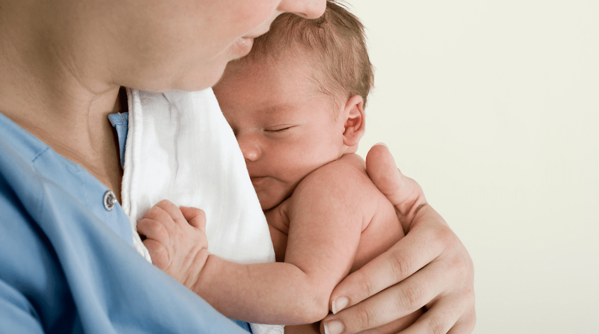 Newborn nanny caring for sweet baby girl in Denver.