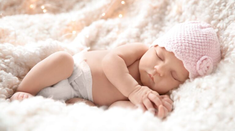 Newborn baby girl sleeping.